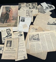 an assortment of newspapers and papers with pictures of presidents, including lincoln's wife