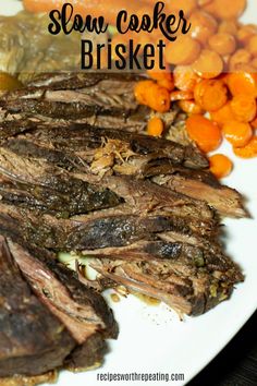 slow cooker brisket on a plate with carrots