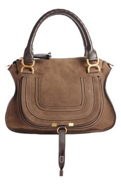 A cult-classic bag with equestrian-inspired styling, this leather satchel features wrapped top handles, topstitched accents at the flap and gleaming hardware. Swingy tassels and a removable shoulder strap complete the just-right bag. Top zip closure Rolled top handles; removable, adjustable shoulder strap Slip pocket beneath exterior flap Interior zip and wall pockets Leather Made in Italy Designer Handbags This brand has B Corp certification, representing business practices with emphasis on soc Chloe Marcie Medium, Medium Handbags, Leather Satchel Bag, Classic Bags, French Chic, Chloe Marcie, Chloe Bag, Day Bag, Nubuck Leather