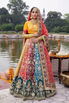 Buy Pakistani Bridal Dresses-Bridal Mehndi Multi-Colored Lehengas With Choli-Pakistani Bridal Wear With Sequins, Thread, Dabka, Tila, Kora, Stones Embroidery Work In USA, UK, Canada, Australia Visit Now : www.NameerabyFarooq.com or Call / Whatsapp : +1 732-910-5427 Bride Choli, Bridal Choli, Pakistani Bridal Dress, Mehndi Dress, Embroidery Motif, Yellow Lehenga, Dresses Traditional, Pakistani Clothes, Dresses Design