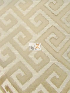 an upholstered fabric with white and beige geometric designs on it's sides