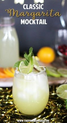 the classic margarita mocko cocktail is served in a glass with lime garnish