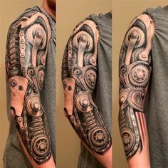 a man's arm with some tattoos on it and a wrench in the middle