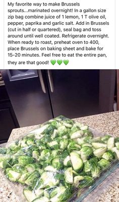 a glass baking dish filled with brussel sprouts on top of a counter