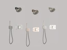 four different types of shower faucets and handsets