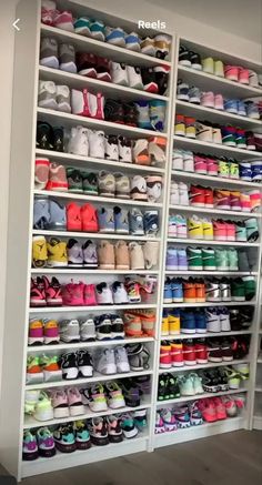 there are many pairs of shoes on the shelves