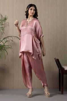 Pink top with pleat detail and beads embroidered neckline. Paired with dhoti pant. - Aza Fashions Transitional Embellished Silk Sets, Unstitched Silk Pant Set, Festive Dabka Embellished Tops, Designer Silk Pant Set For Summer, Traditional Drape Pant Set For Eid, Raw Silk Tops With Traditional Drape, Silk Sets With Dabka Detailing For Summer, Embellished Straight Kurta Set For Summer, Summer Designer Raw Silk Sets