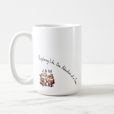 a white coffee mug with two teddy bears on the front and bottom, saying everything life one should do