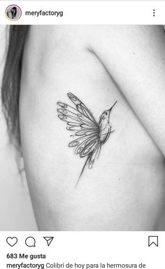 a black and white photo of a hummingbird tattoo