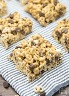 chocolate chip cereal bars are arranged on a towel