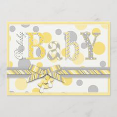 a card with the word baby on it and yellow polka dot ribbon around the corner