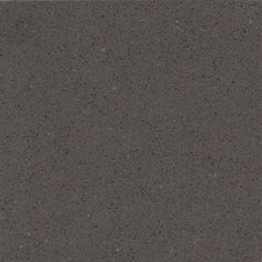 an image of a dark colored surface that looks like granite