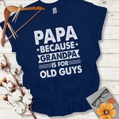 Funny Papa T-Shirt | Because Grandpa is for Old Guys | Gift for Grandpa | Grandfather Shirt | Father's Day Gift | Papa T-Shirt | Granddad Humor Tee | Cool Grandpa Shirt | Unique Grandfather Gift | Grandpa Lover Shirt | Family GiftProduct Features:Fabrication: Medium fabric (5.3 oz/yd² (180 g/m²)), 100% cotton (fiber content may vary for different colors)Seams: Without side seamsFit: Classic FitSizing: Family SizingLabel: Tear-away label Grandfather Shirts, Grandfather Gifts, Gift For Grandpa, Grandpa Shirt, Grandpa Gifts, Personalize Bag, Funny Tees, Family Shirts, Cotton Fiber