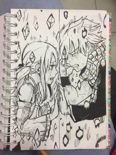 a drawing of two anime characters next to each other on a note book with colored pencils