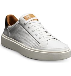 White Leather Slip-on Sneakers For Sports, Sporty Leather Slip-on Sneakers With Perforations, Sporty Slip-on Walking Shoes With Perforations, Sporty Leather Slip-on Sneakers With Contrast Sole, Leather Athleisure Walking Shoes For Light Sports, Functional Leather Slip-on Sneakers, Functional Leather Low-top Slip-on Sneakers, Functional Low-top Leather Slip-on Sneakers, Athleisure Sneakers With Vented Sides And Round Toe