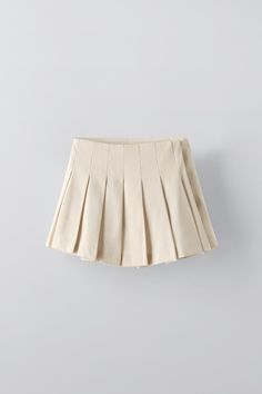 FLOWY PLEATED SKIRT - Sand | ZARA United States Solid Color Pleated Mini Skirt, Chic Pleated Hem Flared Tennis Skirt, Pleated Skirted Skort, Chic Skirted Skort With Pleated Hem, Chic Pleated Skirted Skort, Spring Pleated Flared Mini Skirt, High Waist Skirt For Summer School Uniform, Elegant Cotton Pleated Mini Skirt, Spring Solid Color Tennis Skirt With Pleated Hem