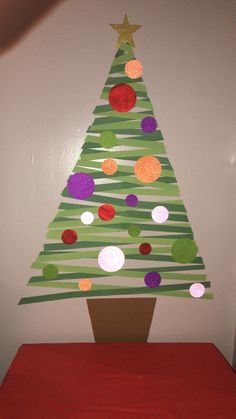 a christmas tree made out of construction paper