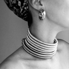 A unique African Tribal Necklace made from silver wire, lightweight and easy to wear all day long!  If you want you can combine more from our tribal neck rings for a more exciting result.  A special, unique Statement piece inspired from African beauty. You can choose the number of rings you want from the variation, 1 and up to 8 neck rings. The model is wearing 8 neck rings You can give the neck measurements you want and we can make these just for you! You can also have them in gold, check the r Piercing Bar, Neck Rings, African Accessories, Neck Jewellery, African Jewelry, Silver Bangle Bracelets, Sterling Silver Bangles, Choker Necklaces, Chain Choker