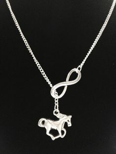 What a stunning necklace! Silver tone charms on 18" chain with lobster clasp. "Y" style. Infinity charm is approx. 24x8mm and horse charm is approx. 15x20mm.  Very unique! I can adjust the length of chain if you prefer a different length. The chain is made of silver plated Alloy.-Ships with gift packaging.-Invoices are not included in packages unless requested.-Birthstone charms can be purchased for this piece with this link:  https://www.etsy.com/listing/195923344-Initial/ Letter charms can be Best Friend Necklaces For 2, Sports Mom Gifts, 2 Horses, Friends Gifts, Infinity Charm, Equestrian Gifts, Best Friend Necklaces, Friend Necklaces, Cross Jewelry