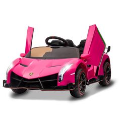 a pink car with the doors open and seats folded down in front of it, on a white background