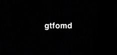 the word gttomd written in white on a black background