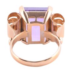 Vintage Retro amethyst 18K rose gold ring, circa 1940. This 18 karat rose gold Retro design ring features an emerald cut amethyst at 14.09 carats. This vintage amethyst ring is a size 5 and is appraised at $2,081. Item #MICO 600 Vintage Amethyst Ring, Solvang Ca, 1 Carat Diamond Ring, Amethyst Ring Vintage, Resize Ring, Blue Zircon, 14k Gold Ring, Amethyst Ring, White Gold Rings