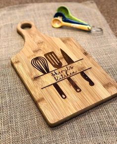 personalized cutting board with utensils on it