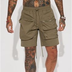 Men’s Large Utility Cargo Shorts , Brand New From Fashion Nova Khaki Cargo Shorts For Streetwear, Khaki Shorts For Streetwear, Summer Streetwear Shorts With Functional Pockets, Sporty Khaki Shorts For Streetwear, Khaki Shorts With Side Pockets For Streetwear, Urban Cargo Style Shorts For Streetwear, Summer Streetwear Athletic Shorts With Pockets, Khaki Cargo Pocket Shorts For Streetwear, Khaki Cargo Shorts With Built-in Shorts For Streetwear