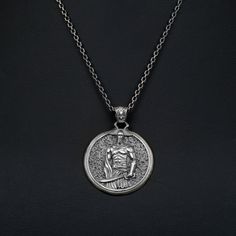 These 925K Sterling Silver Leonidas Necklace photos are taken with original and every item has handmade engraving details. It's very elegant and classy for everyday use but also can be preferred as a gift for friends and family for an eternal memorial. *  Item Details * Gender : Male / Female * Material : 925 Sterling Silver * Pendant Diameter : 3.00 x 3.00 cm (1.25 x 1.25 inc) * Bail With : Suitable for up to 3.00 mm Chain * Pendant Weight : 11.70 Grams * Chain Thickness : 0.15 cm -( 0.06 inche Gothic Necklace Men, Medieval Style Metal Pendant Necklaces, Male Pendant, Black Medieval Pendant Jewelry, Gothic Male, Male Necklace, Luxury Mythological Pendant Necklaces, Mens Silver Pendants, Warrior Necklace