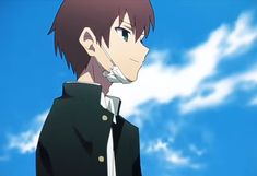 an anime character with black hair and green eyes looking to the side while standing in front of a blue sky