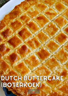 a close up of a pie on a plate with the words dutch butter cake written below it