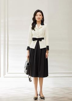 Look no further than these Elegant Black and Cream Skirt Suits for the perfect combination of professionalism and chic elegance. The perfect workwear for the modern woman, these suits offer ultimate sophistication and unsurpassed comfort. Buy now and look your best for any business or social occasion. Peak lapels; front button blazer V-Neck, Long sleeves; Structured shoulders. Blazer and Pant Polyester 94% Spandex 6% Lining: Polyester 100% Imported Brand - AD&KM® Model Number - S1510, S13127, C1 Cream Skirt, Skirt Suits, Black And Cream, Blazer Buttons, Look Your Best, Skirt Suit, Modern Woman, Work Wear, The Modern