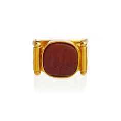 Classical elegance always attracts my eye.  This beautifully detailed and crafted signet is a refined example of jewelry crafted in England during the Victorian period that referenced architectural and ancient findings of the century before from ruins found at Pompeii and Herculaneum.  This hand crafted 18KT Gold ring with an engraved tablet of carnelian sports a warrior on horseback. A quintessential style of this period.  3 bands of warmly hued gold showcase a central cushion shaped tablet and 2 torpedo shaped shoulders on each side.  Elegant and strong.  A true statement signet.   Not marked but tested 18KT. 7.9 grams.  Size 5.5  but can be resized within reason. Antique Carnelian Intaglio Rings, Antique Ceremonial Signet Ring With Intaglio, Ceremonial Byzantine Cabochon Jewelry, Antique Intaglio Signet Ring For Ceremonial Occasions, Ceremonial Byzantine Jewelry With Cabochon, Antique Intaglio Ceremonial Jewelry, Antique Intaglio Jewelry For Ceremonial Occasions, Antique Ceremonial Intaglio Jewelry, Vintage Carnelian Signet Ring For Formal Occasions