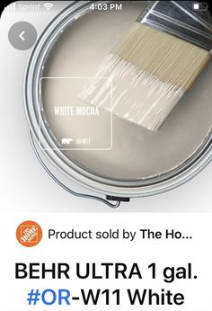 a can of paint with the words behr ultra 1 gal or w1 white on it