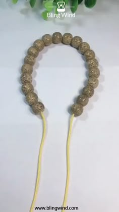 a close up of a string with beads on it