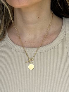 ➣ High quality 14K Yellow Gold 18 Inch Paperclip Engravable Circle Disc Necklace With Toggle Closure  ➣ MATERIAL: 14K Yellow Gold  ➣ Closure: Toggle Clasp   ➣ Solid / Hollow: Hollow  ➣ Weight: 3.50g  ◈ Please note that weights are approximate.  ➣ If you need a specific length, please message us.  ➣ SHIPPING: ◈ We always offer domestic FREE SHIPPING via USPS first class (3-5 business days)  ◈ We ship internationally, shipping costs are shown at checkout.     Please be aware that the buyer is resp Gold Vermeil Jewelry, Sparkly Things, Women Necklace, Vermeil Jewelry, Disc Necklace, Engraved Items, Initial Pendant, Toggle Clasp, Paper Clip