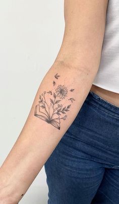 Book Tattoos for Literature Lovers Tattoo For Creativity, Small Tattoos That Go Together, Book Tattoos Ideas, Book And Daisy Tattoo, Creative Book Tattoos, Homeschool Tattoo, Tattoo Ideas Teacher, Tattoos About Books, Teacher Inspired Tattoos