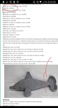 an image of a knitted shark with the text'how do you see it? '