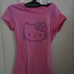 Pink Hello Kitty Tee With Gem Detail Size S. 100% Cotton. Armpit Tp Armpit 11 3/4 Inches. Top To Bottom 18 5/8 Inches. P-B4 Pink Leopard Print Shirt, Pink Cotton Hello Kitty T-shirt, Pink Hello Kitty Short Sleeve T-shirt, Pink Short Sleeve Hello Kitty T-shirt, Hello Kitty Crew Neck Top, Pink Hello Kitty Cotton Top, Fitted Hello Kitty Crew Neck Top, Fitted Cotton Hello Kitty Top, Hello Kitty Baby Tee