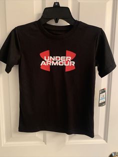 NWT-Boys Under Armour graphic shirt •HeatGear keeps him cool •Black with UNDER ARMOR in the front in white and red •Short sleeves •Crewneck •Size 5. Excellent condition Red Shorts, Graphic Shirt, White And Red, Under Armor, Graphic Shirts, Short Sleeve Shirt, Under Armour, Short Sleeves, Sweatshirts