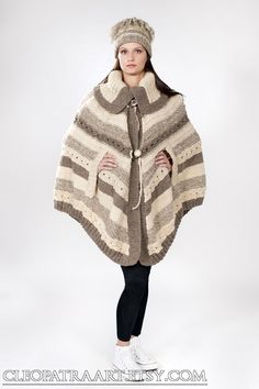 A winter poncho made of pure undyed wool. It is voluminous, heavy and really really warm! Cozy Wool Poncho Cape, Oversized Alpaca Poncho For Winter, Bohemian Knitted Winter Cape, Bohemian Knitted Cape For Winter, Beige Wool Shawl For Winter, Winter Beige Wool Shawl, Beige Wool Winter Shawl, Beige Bohemian Winter Cape, Winter Alpaca Cape Poncho