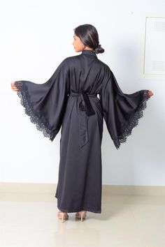 Black satin dressing gown kimono with dramatic wide sleeves. Enjoy your time at home in comfy and elegant loungewear that makes each day special ➡️ Shop now! Feminine Loungewear, Villain Arc, Elegant Loungewear, Natural Dramatic, Black Satin Robe, Satin Dressing Gown, Rose Gown, Lingerie Gown, Long Cocktail Dress