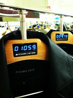 there are many seats with electronic clocks on them