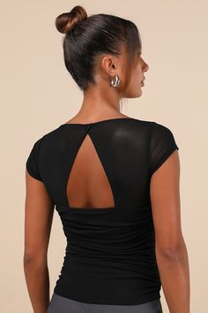 From club cuties to flirty fashionistas, everyone will love the Lulus Exceptional Flirtation Black Mesh Ruched Cutout Short Sleeve Top! Stretchy mesh fabric shapes this elevated top with short, cap sleeves and a sweetheart neckline (with hidden no-slip strips). Fitted, ruched bodice features padded cups and hidden underwire support. Turn around to reveal a flirty back cutout that will keep all eyes on you. Fit: This garment fits true to size. Length: Size medium measures 21" from shoulder to hem Cutout Top, Adhesive Bra, Cut Out Top, Ruched Bodice, Tops Fall, Black Mesh, Short Sleeve Top, Mesh Fabric, Sweetheart Neckline