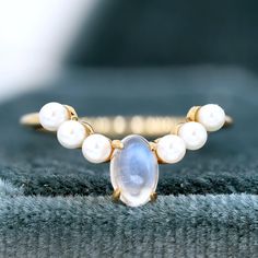 Moonstone Ring, 14k/18k Solid Gold Ring, Moonstone Ring with Moissanite, Engagement Ring, Gift For Her, Natural Moonstone Ring for Women  (in stock) - Metal: 18K Yellow Gold - Custom Color: Yellow Gold, Rose Gold, and White Gold  - Gross weight: 1.55g - Gold Weight: 1.33g - Gemstones: Moonstone, Pearl - Moonstone CTW: 0.610 (1pcs) - Pearl CTW: 1.08 (6pcs) - Ring size: 6 - Ring Width: 19.19mm Approximately - Ring Height: 22.89mm Approximate Shipping It usually takes 2-3 weeks to make and 3-5 days to ship We apply a tracking number for every single package. Engraving You can order a custom engraving. (just contact me in advance) Ring Moonstone, Solid Gold Ring, Solid Gold Rings, Color Ring, Moonstone Ring, Ring For Women, Moissanite Engagement Ring, Moissanite Engagement, Gold Rose