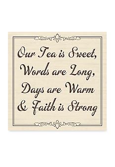 a sign that says our tea is sweet words are long days are warm and faith is strong