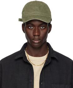 Cotton twill cap in khaki. · Curved brim · Embroidered eyelets at crown · Cinch fastening Supplier color: Washed olive Green Cap Outfit, Cap Outfit, Green Cap, John Elliott, Dad Cap, Dad Caps, Dad Hat, Cotton Twill, Mens Accessories