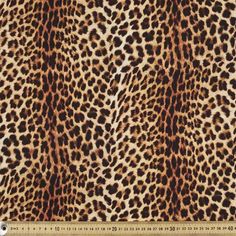 an animal print pattern is shown in brown and black