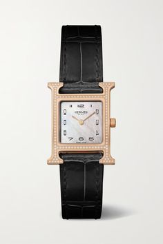 Originally created by Parisian designer Philippe Mouquet, Hermès' 'Heure H' watch highlights the maison's monogram with an 18-karat rose gold case glistening with radiant diamonds. The dial is equally enchanting - set with delicate mother-of-pearl that glows beneath Arabic numerals and sword-shaped hands. As with all of the brand's timepieces, the straps are interchangeable, but the original black alligator is a classic.Each Hermès 'Heure H' watch comes with instructions on how to change the str Dream Accessories, Luxurious Accessories, Hermes Watch, Black Alligator, Piece By Piece, Watches Women, Black Down, Rose Gold Case, Lucky Charms