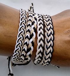 Hemp Bracelet or Anklet Braided in White, Natural, & Black.  Choose from 5 different designs of varying widths & patterns See photos for each: Traditional = 6mm wide Fishtail =  5mm Center Black = 9mm Feathered = 9mm Half Inch = 12mm Braided with 1 mm hemp cord For best results choose the size that equals your wrist or ankle size.  Then tell me if you want Skin Tight (adds 0 in)  Wiggle Room (adds 1/4 in) Braided to the measurement of the size selected knot to knot.  2 additional inches of loose Casual White Woven Braided Bracelets, Casual White Woven Braided Bracelet, Casual Black Woven Friendship Bracelets, Adjustable White Braided Beaded Bracelets, White Braided Bracelets For Festivals, Sliding Knot Bracelet, Hemp Bracelet, Hemp Jewelry, Hemp Bracelets